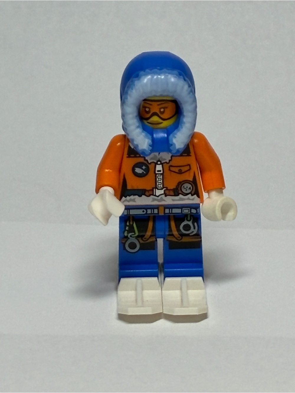LEGO Orange Jacket Minifigure with Blue Hood & White Boots